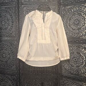 adorable creamed color blouse with very nice details and pre- loved